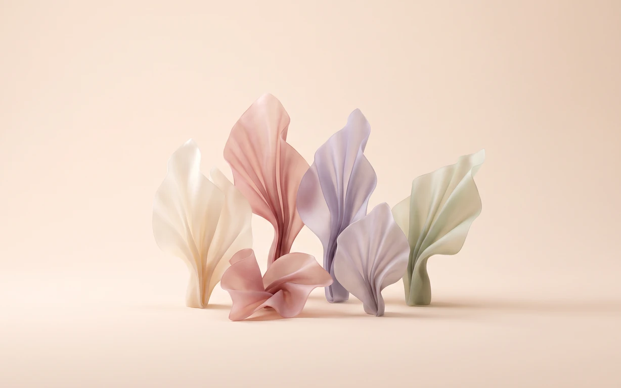 A quiet studio still life of softly folded, translucent sculptural forms in ivory, blush, lilac, and pale sage, arranged on a warm peach seamless surface with gentle shadows.